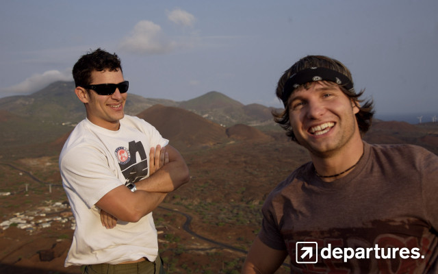 Two men hilltop mountains sky free wallpaper - medium preview image