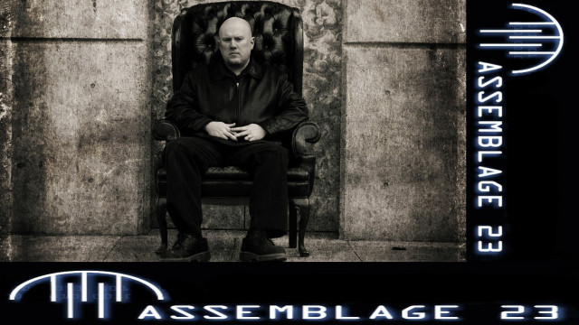 Man sitting chair building sign free wallpaper - medium preview image