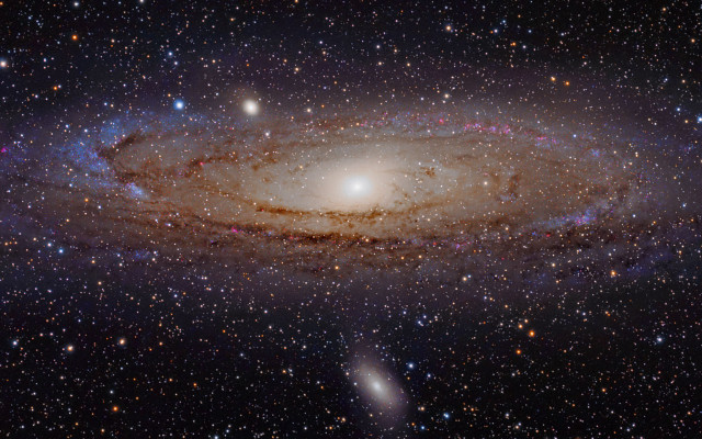 Large spiral galaxy bright center #2 free wallpaper - medium preview image
