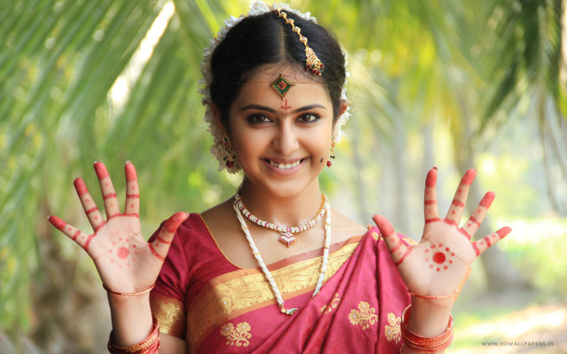 Woman red sari hands up free wallpaper - medium preview image