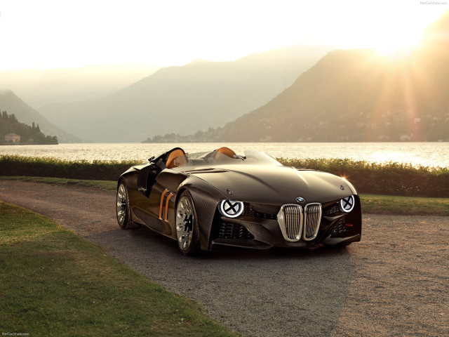 Car parked road water mountains free wallpaper - medium preview image