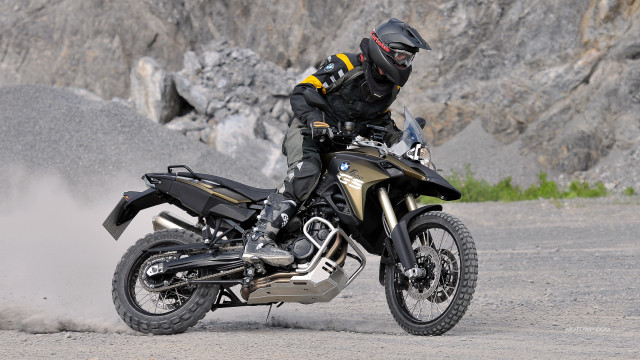 Man motorcycle dirtroad mountainside helmet free wallpaper - medium preview image