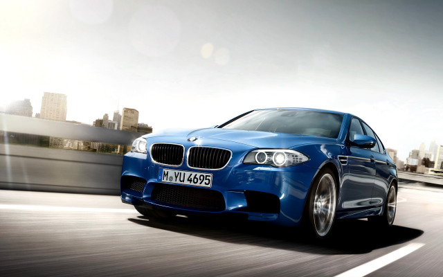 Blue car city street bridge free wallpaper - medium preview image