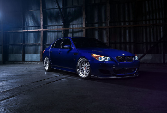 Blue car parked garage nighttime free wallpaper - medium preview image
