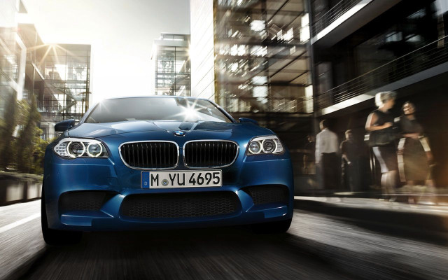 Blue car city street tall free wallpaper - medium preview image