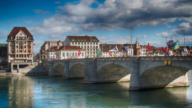Bridge river buildings cloudy sky free wallpaper - medium preview image