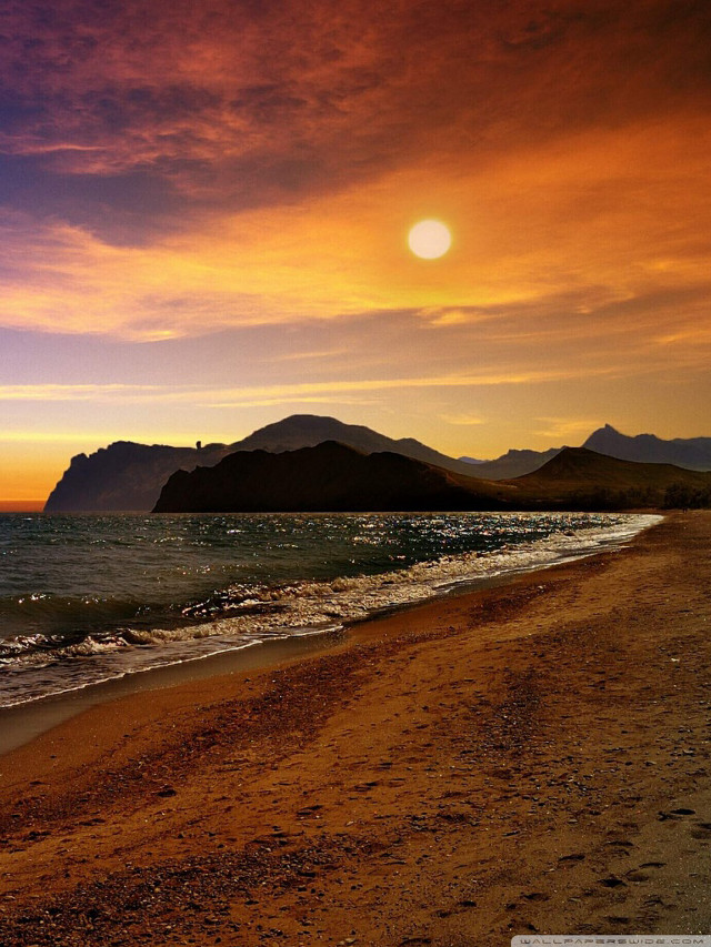 Beach sunset mountain person walking free wallpaper - medium preview image