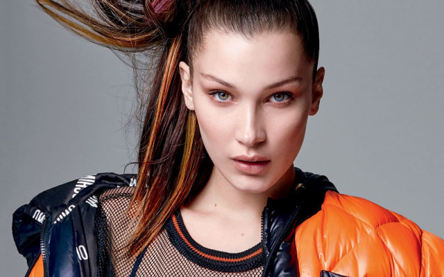 Woman ponytail jacket head pose free wallpaper - medium preview image