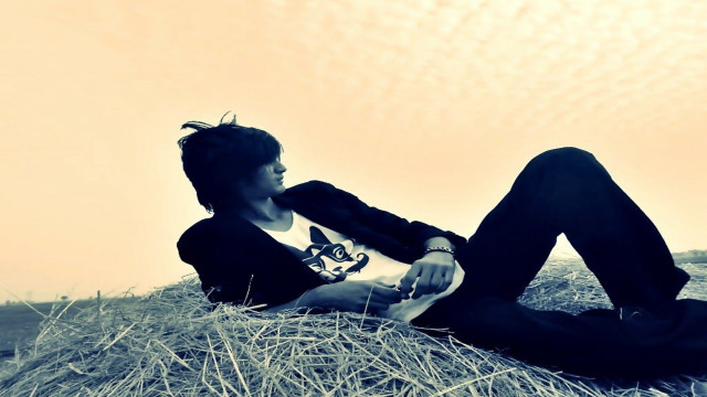 Woman sitting hay guitar sky free wallpaper - medium preview image
