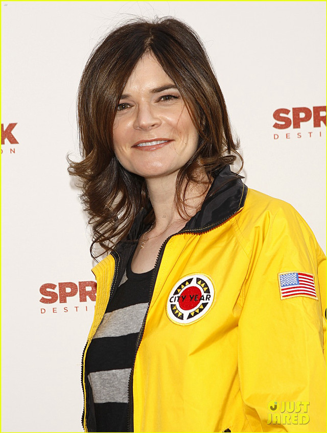 Woman yellow jacket smiling red free wallpaper - medium preview image