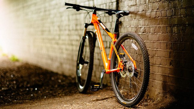Bike brick wall building side free wallpaper - medium preview image