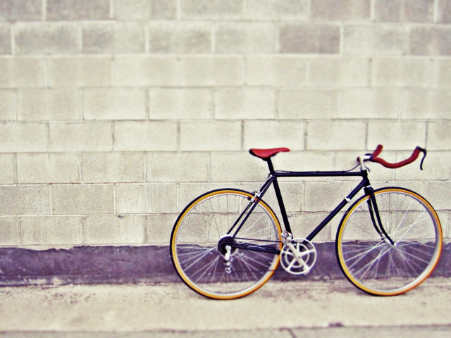 Bike parked street brick wall #2 free wallpaper - medium preview image