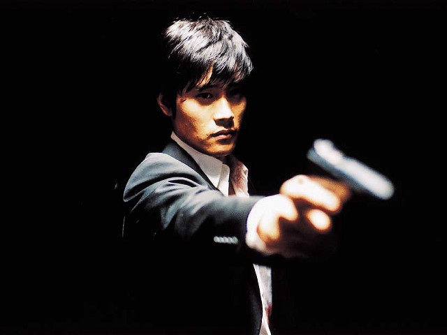 Man suit gun pointing serious #2 free wallpaper - medium preview image