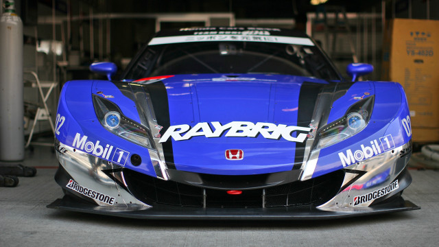 Blue sports car garage racing free wallpaper - medium preview image