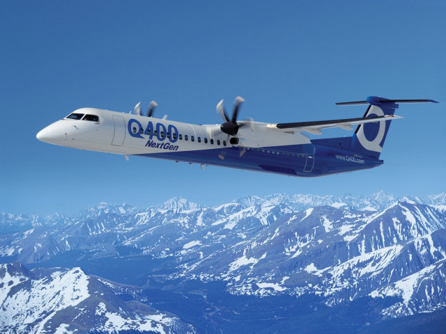 Large passenger jet flying mountains free wallpaper - medium preview image