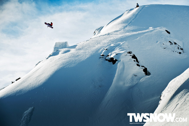 Snowboarder jumping snowy mountain blue free wallpaper - medium preview image