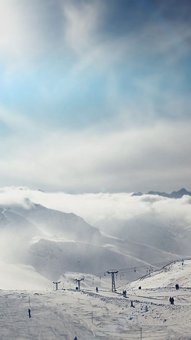 Ski slope skiers mountain clouds free wallpaper - medium preview image