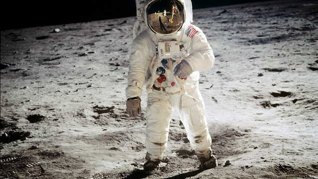 Astronaut walking moon helmet space free wallpaper - medium preview image
