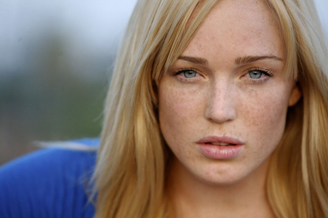 Woman freckled hair blue eyes free wallpaper - medium preview image