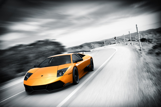 Yellow sports car cloudy road free wallpaper - medium preview image