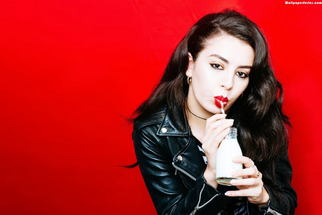 Woman red lipstick holding bottle free wallpaper - medium preview image