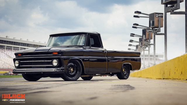 Black truck parking lot yellow free wallpaper - medium preview image