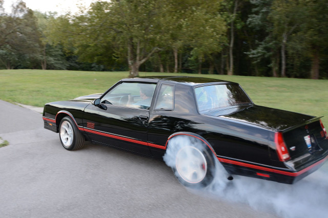 Black car red stripes smoking free wallpaper - medium preview image