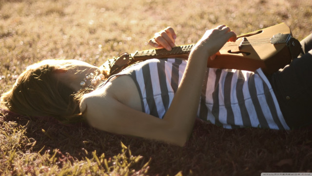Woman guitar book laying striped free wallpaper - medium preview image
