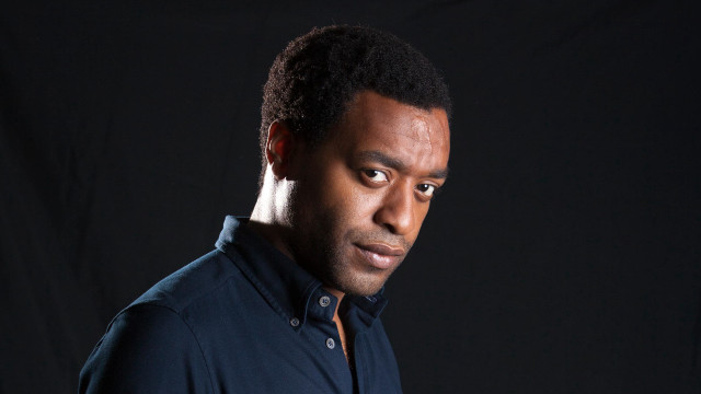 Man black shirt studio portrait free wallpaper - medium preview image