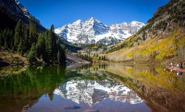 Mountain lake trees people sitting free wallpaper - medium preview image