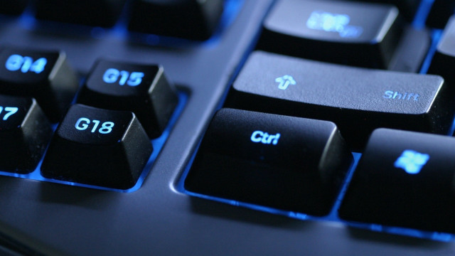 Blue keys closeup black background #3 free wallpaper - medium preview image