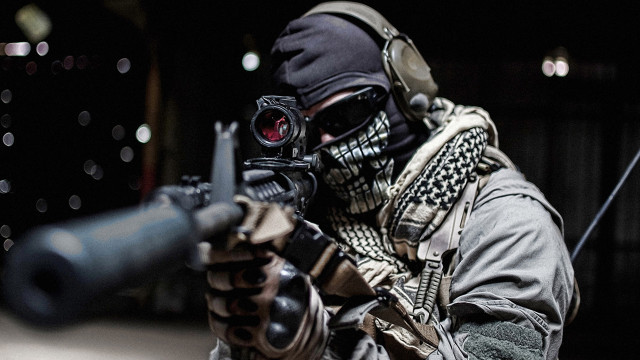 Man mask gun aiming holding #2 free wallpaper - medium preview image