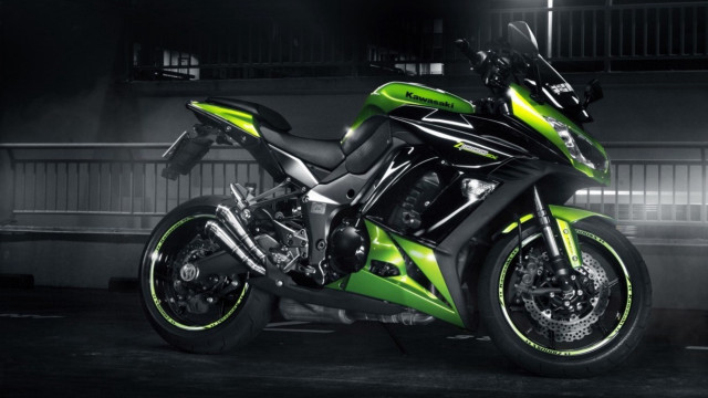Green black motorcycle garage night free wallpaper - medium preview image