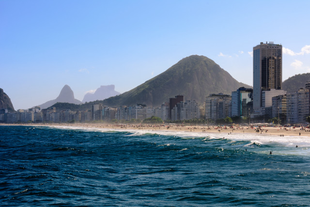 Beach mountain buildings shore foreground free wallpaper for desktop - medium preview image