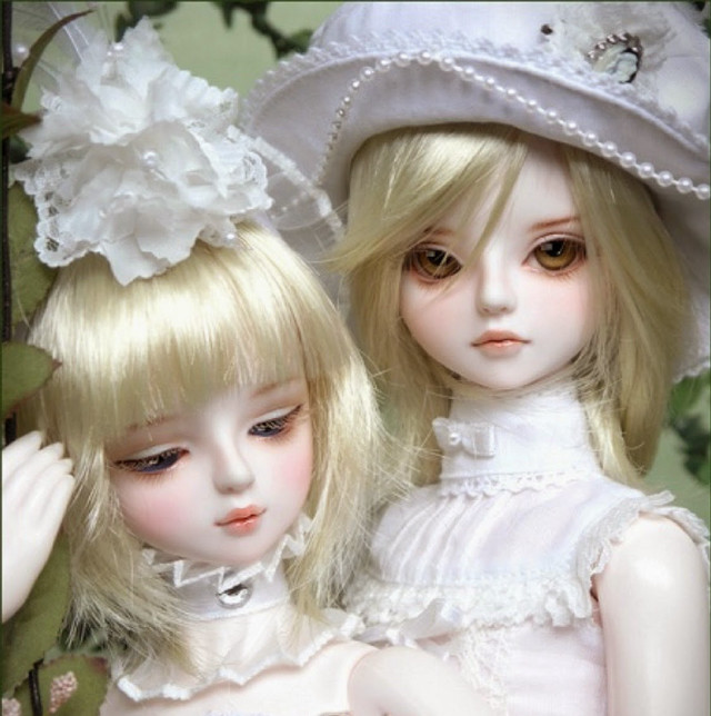 Two dolls hats dresses flowers free wallpaper - medium preview image