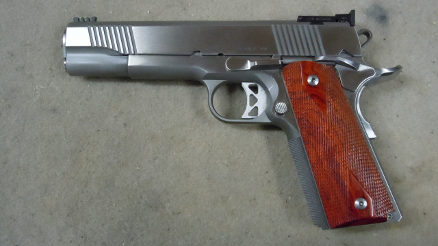 Gun wooden barrel concrete metal free wallpaper - medium preview image
