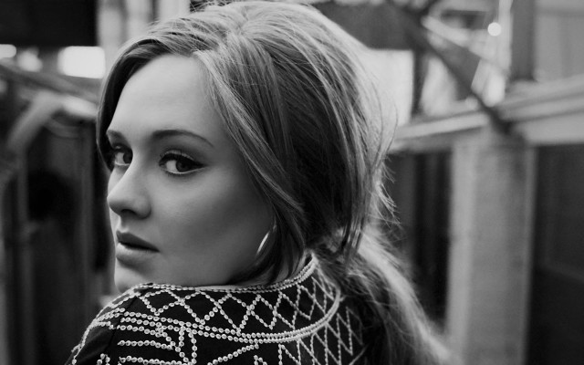 Woman long hair serious sweater free wallpaper - medium preview image