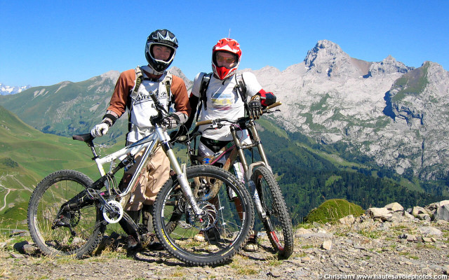 Two people mountain peaks blue free wallpaper - medium preview image