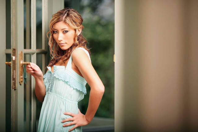 Woman blue dress door handle free wallpaper - medium preview image