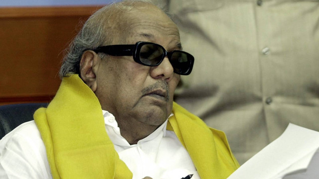 Man sunglasses yellow scarf sitting free wallpaper - medium preview image