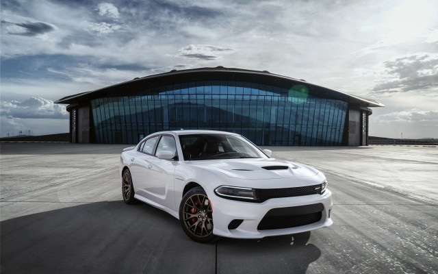 White car building sky clouds free wallpaper - medium preview image