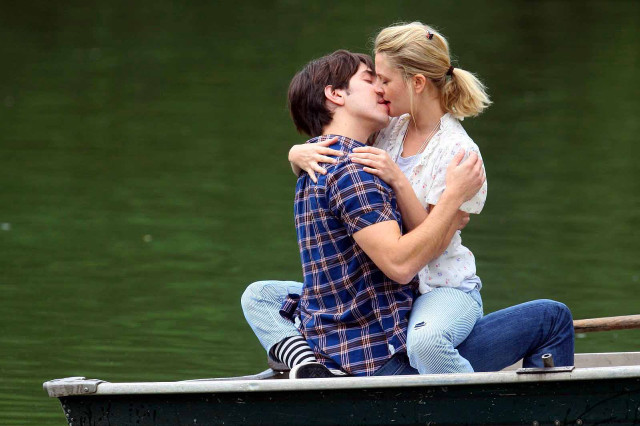 Man woman kissing boat lake #3 free wallpaper - medium preview image