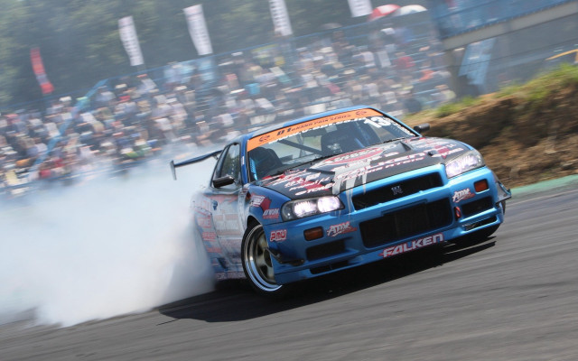Blue car smoke race track free wallpaper - medium preview image