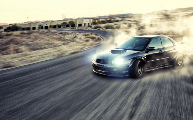 Car driving dust tires spinning #2 free wallpaper - medium preview image