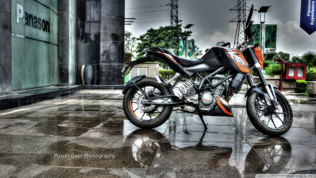 Motorcycle parked wet sidewalk clock free wallpaper - medium preview image