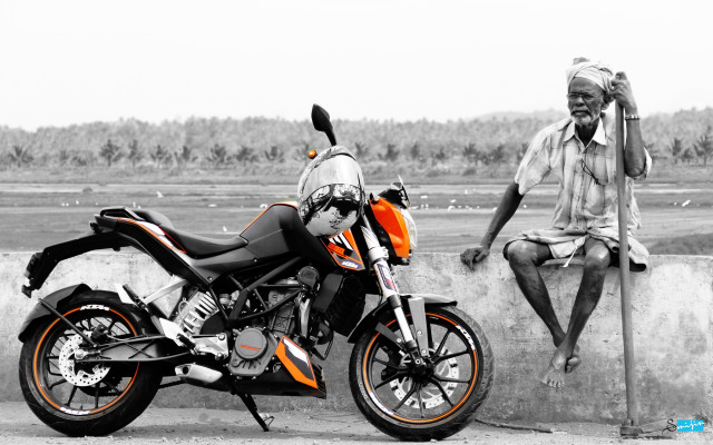 Man sitting wall motorcycle hat free wallpaper - medium preview image