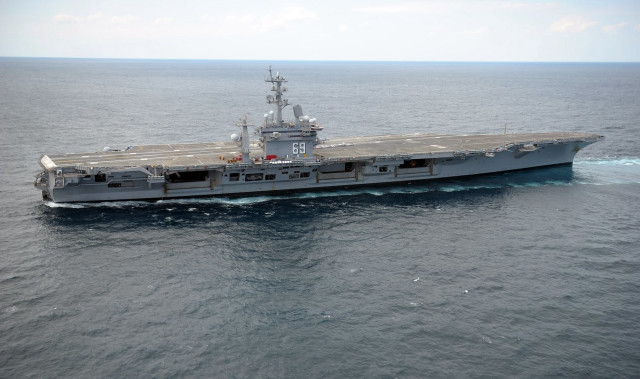 Large ship ocean smaller boat free wallpaper - medium preview image