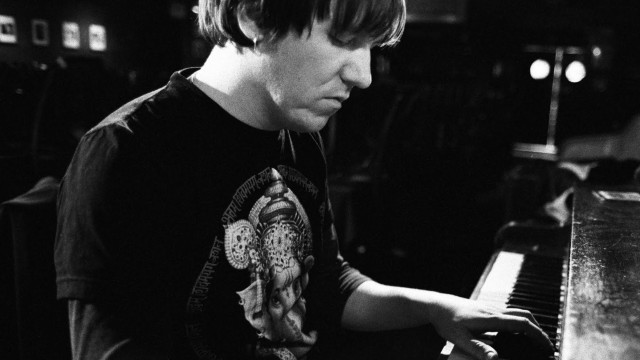 Piano player dark room blackwhite free wallpaper - medium preview image