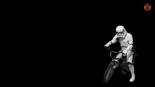 Man riding bike black background free wallpaper - medium preview image