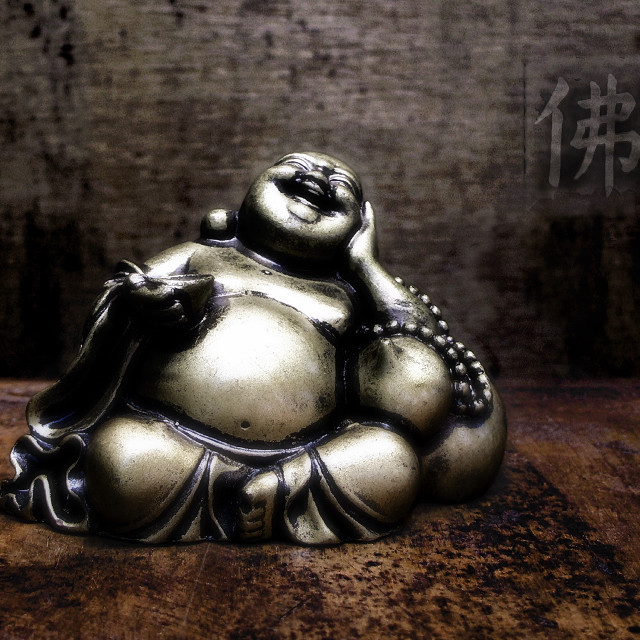 Buddha statue table brick wall free wallpaper - medium preview image
